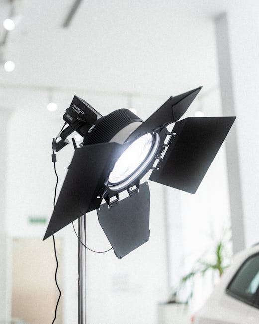 Close-up of studio spotlight in a modern setting, highlighting professional lighting equipment.